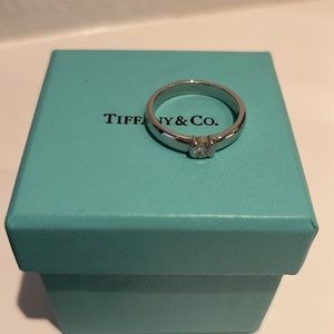 Tiffany & Co. .31ct Platinum Etoile solitaire band, beautiful condition.